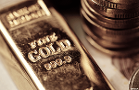 Softer Dollar Gives Gold a Break